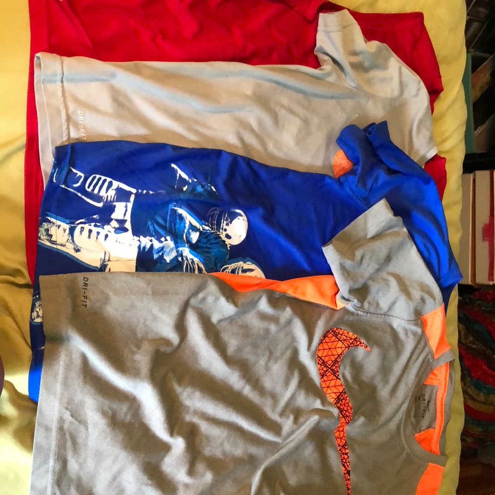4 Dri fit shirts.
